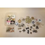 A COLLECTION OF MILITARY AND OTHER BADGES AND BUTTONS ETC