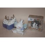 A NAO FIGURE OF RABBITS IN A BASKET, TOGETHER WITH A NAO SEATED RABBIT FIGURE AND A LLADRO OF A