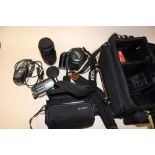 A CANON EOS30 CAMERA WITH CARRY BAG AND ACCESSORIES TOGETHER WITH A SONY HANDICAM