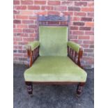 AN EDWARDIAN MAHOGANY CARVED GENTLEMANS ARMCHAIR