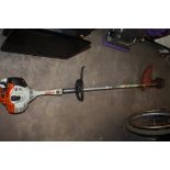 A STHIL FS70 RC PETROL STRIMMER PLUS HARD HAT