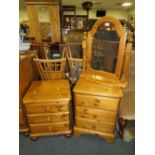 TWO HONEY PINE BEDSIDE CHESTS AND A MIRROR (3)