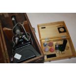 AN OAK CASED C.BAKER OF LONDON 5340 MICROSCOPE WITH A BOX OF ACCESSORIES