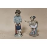 A NAO FIGURE OF A YOUNG BALLERINA, TOGETHER WITH A NAO FIGURE OF A BOY HOLDING A BAG WITH A DOG (2)