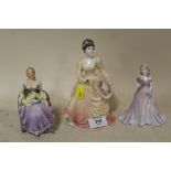 A COALPORT 'LADY IN LACE' FIGURE, TOGETHER WITH TWO SMALLER COALPORT FIGURES (ONE A/F)
