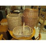 A WICKER LAUNDRY BASKET AND TWO FURTHER BASKETS (3)