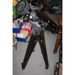 A TASCO 302003 TELESCOPE ON TRIPOD