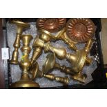 A COLLECTION OF BRASS CANDLESTICKS, COPPER DISHES ETC.