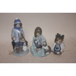 THREE LLADRO FIGURES TO INCLUDE A GIRL WITH A KITTEN AND PUPPY, BOY WITH A DOG AND A BABY GIRL