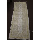 AN ANTIQUE MIDDLE EASTERN DOWRY SHAWL/CLOTH DECORATED WITH HEAVY EMBROIDERED GOLD AND SILVER WIRE