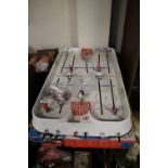 A TABLE TOP ICE HOCKEY GAME TOGETHER WITH A BOXED MICRO SUPER ENDURANCE SCALEXTRIC