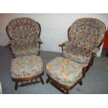 TWO FIRESIDE EASY CHAIRS AND MATCHING FOOTSTOOLS