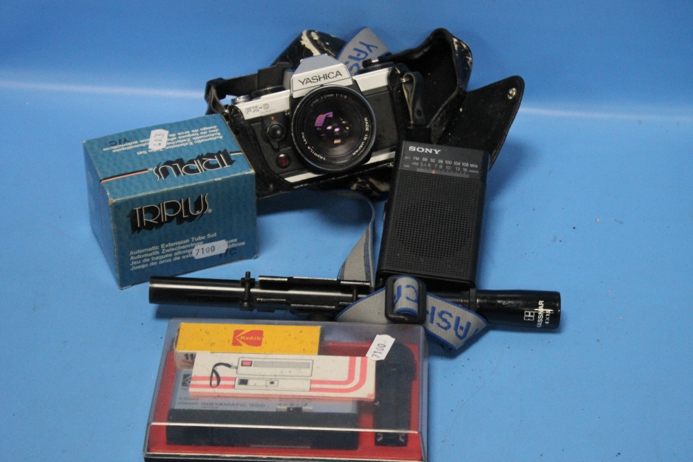 A YASHICA CAMERA, A TELESCOPIC AIR RIFLE SIGHT, A SONY WALKMAN ETC.