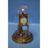 A BLACK DOMED MANTEL CLOCK, NO MAKER'S MARK, H 30 CM