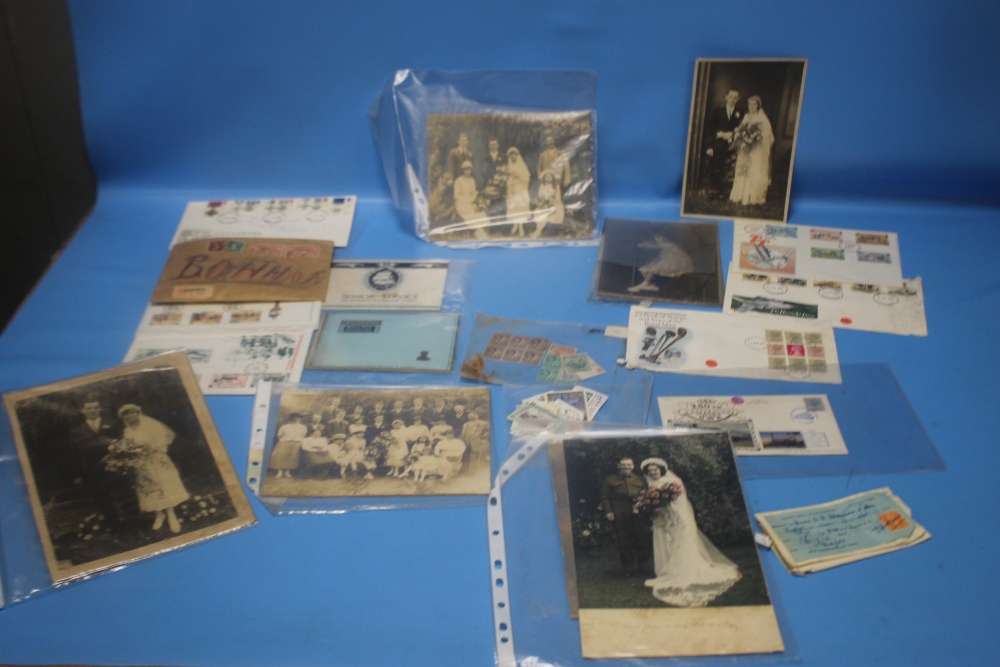 A COLLECTION OF STAMPS, vintage first day covers, old photographs and cigarette cards