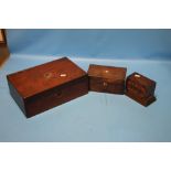 A WOODEN BOX CONTAINING COSTUME JEWELLERY TOGETHER WITH A TEA CADDY AND AN INLAID MONEY BOX