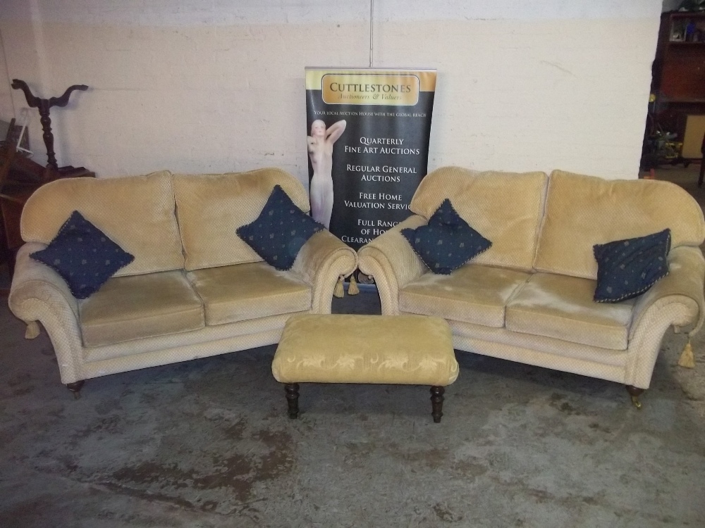 A THREE PIECE SUITE WITH TWO TWO SEATER SOFAS