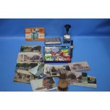 A QUANTITY OF COLLECTABLES TO INCLUDE POSTCARDS, GREEN SHIELD STAMPS, PIN BADGES ETC.