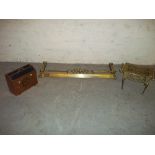 A BRASS TABLE PLANT STAND, A BRASS FIRE FENDER AND A MAGAZINE RACK