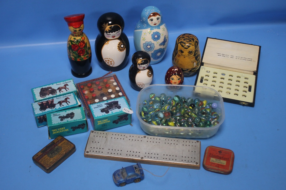 A QUANTITY OF COLLECTABLES TO INCLUDE RUSSIAN DOLLS, BOXED MINIATURE DIECAST PENCIL SHARPENERS,