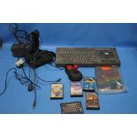 A SINCLAIR ZX SPECTRUM +2 WITH A SMALL COLLECTION OF GAMES, JOY STICK ETC. A/F