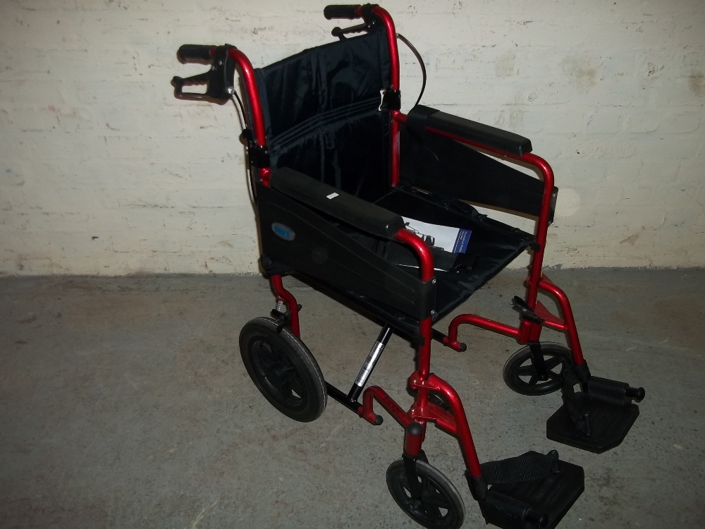 A DAYS FOLDING WHEELCHAIR