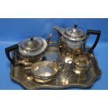 A WHITE METAL TEA SET ON TRAY