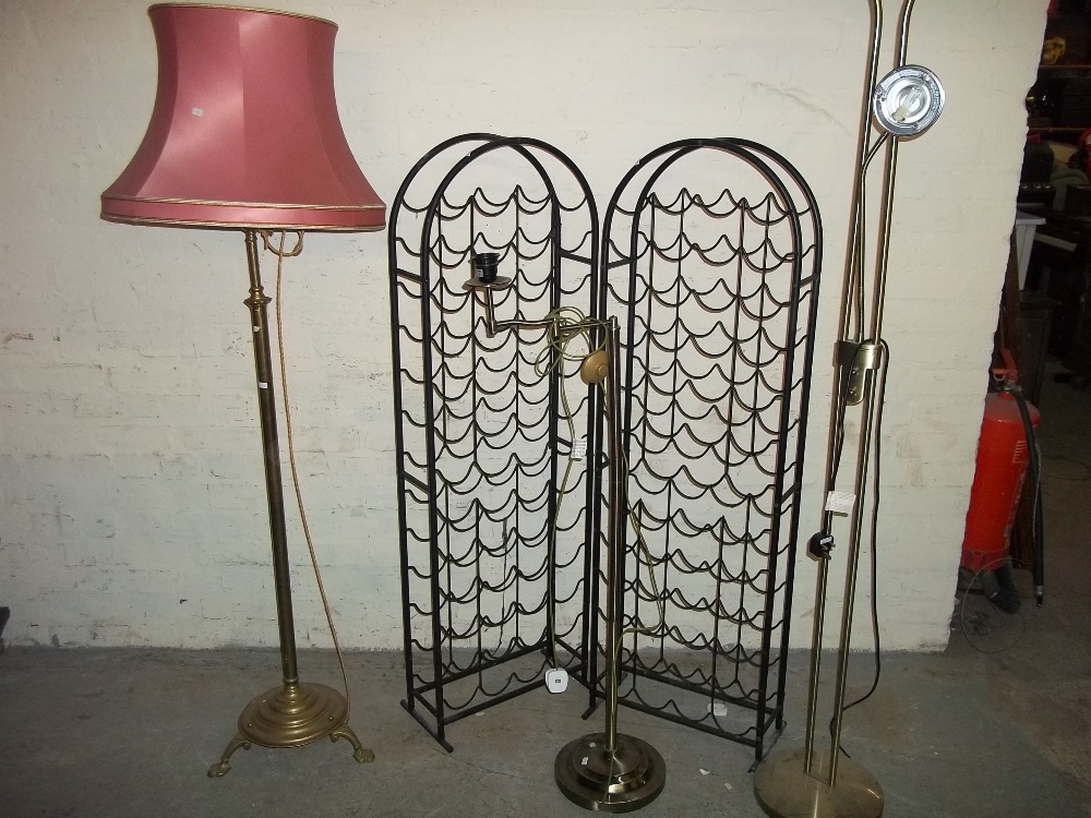 A FLOORSTANDING STANDARD LAMP IN BRASS AND TWO MODERN EXAMPLES WITH TWO WINE BOTTLE RACKS