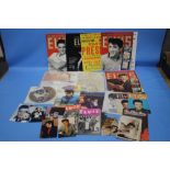 A BOX OF ELVIS MEMORABILIA TO INCLUDE FACSIMILE MAGAZINES, PHOTOGRAPHS ETC.