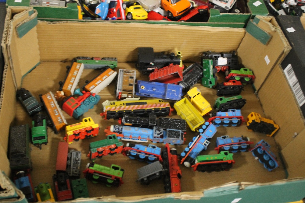 A COLLECTION OF MODEL TRAINS AND CARRIAGES TO INCLUDE 'THOMAS THE TANK ENGINE' TYPE TOGETHER WITH