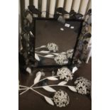A METAL FRAMED MIRROR A/F AND A METAL WALL ART OF FLOWERS