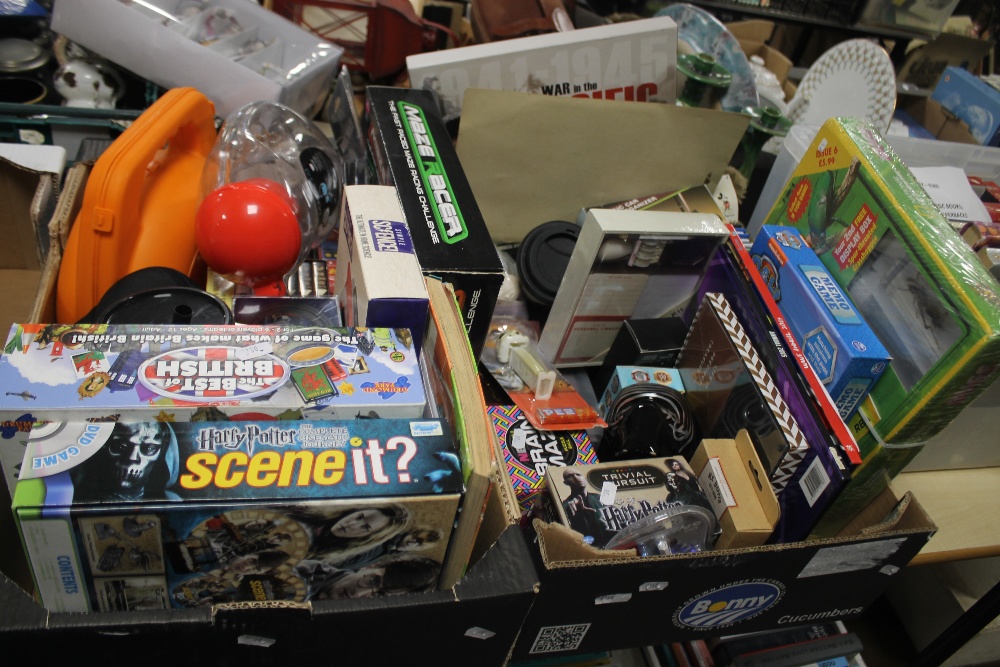 TWO TRAYS OF TOYS AND GAMES TO INCLUDE HARRY POTTER SCENE IT GAME, A STAR WARS REVERSABLE BELT, ETC.