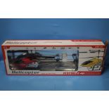 A LARGE BOXED 3.5 CHANNEL REMOTE CONTROL HELICOPTER