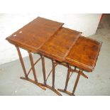 A WALNUT EDWARDIAN STYLE NEST OF TABLES