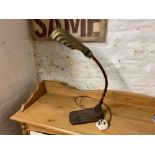 A 1920S COPPER ADJUSTING DESK LAMP WITH SHELL SHAPED WHITE METAL SHADE