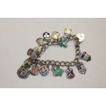 A SILVER AND ENAMEL CHARM BRACELET APPROX WEIGHT 42.2G