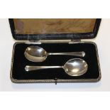 A PAIR OF BOXED HALLMARKED SILVER SPOONS APPROX WEIGHT - 26.8G