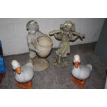 TWO GARDEN FIGURES TOGETHER WITH 2 CERAMIC GEESE