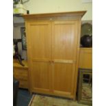 A MODERN LIGHT OAK DOUBLE WARDROBE H-194 W-130 CM