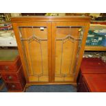 AN OAK GLAZED CHINA CABINET H 126 CM W 92 CM