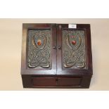 A REPRODUCTION MAHOGANY LETTER RACK WITH ART NOUVEAU STYLE PANEL