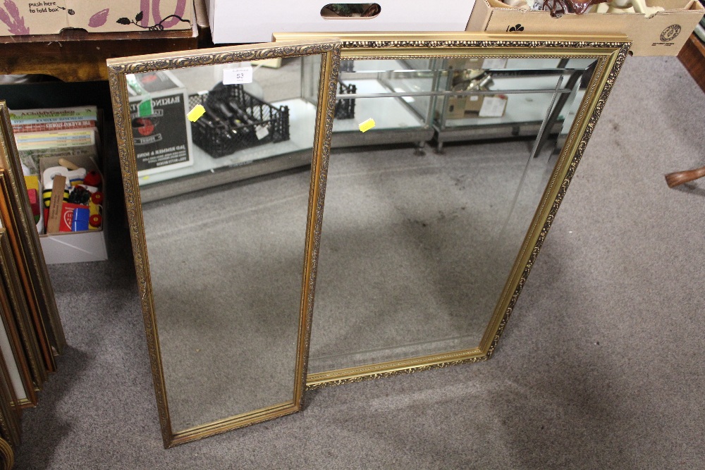 TWO GILT FRAMED WALL MIRRORS, 84 X 30 CM AND 57 X 82 CM