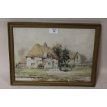 A FRAMED AND GLAZED WATERCOLOUR OF A FIGURE WITH CHICKENS BEFORE COTTAGES, SIGNED H. CUBLEY LOWER