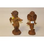 A PAIR OF OUTDOOR CAST METAL CHERUB FIGURES, H 28 CM