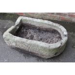 A LARGE SANDSTONE PUMP TROUGH - L 92 CM, W 57 CM