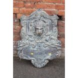 A LARGE METAL LION HEAD AND FIGURAL FOUNTAIN PLAQUE -80 CM W-60 CM