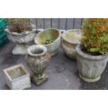 AN ASSORTMENT OF SIX GARDEN PLANTERS (SOME WITH CONTENTS )