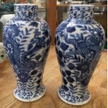 A PAIR OF CHINESE BLUE AND WHITE VASES WITH FOUR CHARACTER MARK UNDER GLAZED MARK TO BASE, HAND