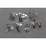 SEVEN PAIRS OF PACKAGED SILVER EARRINGS