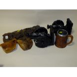 A BLACK FOREST CARVED BOOK SLIDE, A PAIR OF WOODEN MODEL CANONS, TWO EASTERN EUROPEAN JUGS AND A